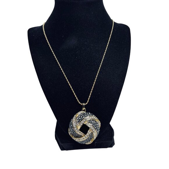 Nolan Miller Jewelry - Nolan Miller Gold Tone Rope Chain Necklace With Love Knot Crystal Pendant (6006)
